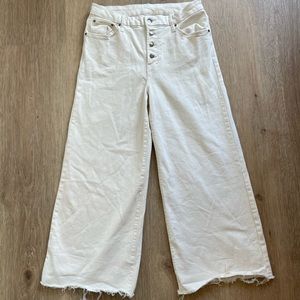 Wide leg white jeans.